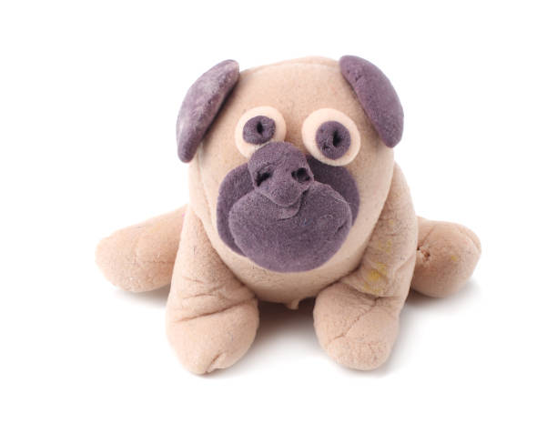 istock plasticine pug dog isolated on white background. modelling clay 1145703864