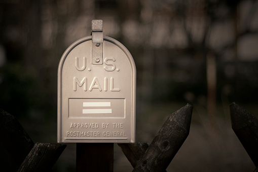 A line of mailboxes or postal boxes on a summer afternoon in New Jersey.