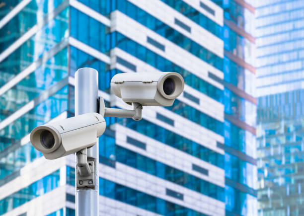 istock Two CCTV security cameras on street 1145713287