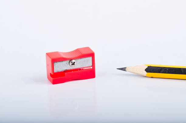istock Back To school Concept, pencil and sharpener over white background 1145719006