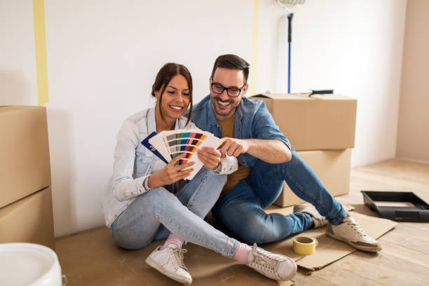 istock Happy couple in their new apartment. 1145720528