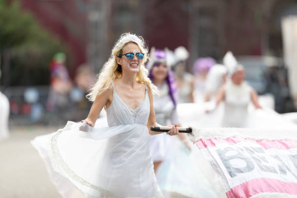 Mardi Gras Parade New Orleans, Louisiana, USA - February 23, 2019: Mardi Gras Parade, Member of the Bearded Oysters, walking down the street at the Mardi Gras Parade mardi gras body painting stock pictures, royalty-free photos & images