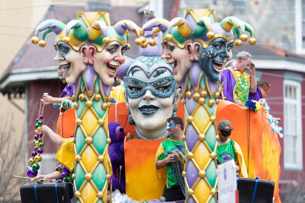 Mardi Gras Parade New Orleans, Louisiana, USA - February 23, 2019: Mardi Gras Parade, Float with Jester heads, going down the street at the parade new orleans mardi gras stock pictures, royalty-free photos & images