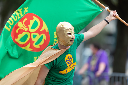 New Orleans, Louisiana, USA - February 23, 2019: Mardi Gras Parade, Members of El Lucha Krewe, Dancing at the Mardi Gras Parade