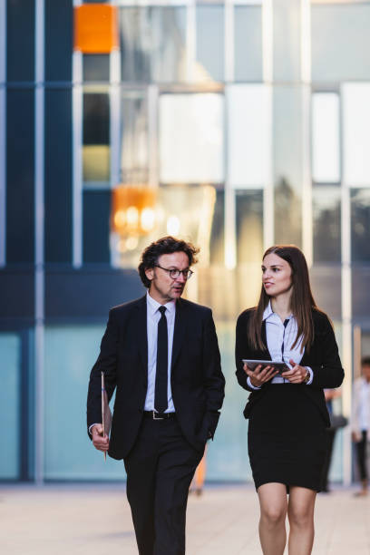 istock Business couple on the move 1145727503