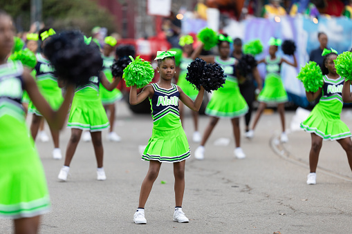 New Orleans, Louisiana, USA - February 23, 2019: Mardi Gras Parade, Members of Akili Academy performing at the parade
