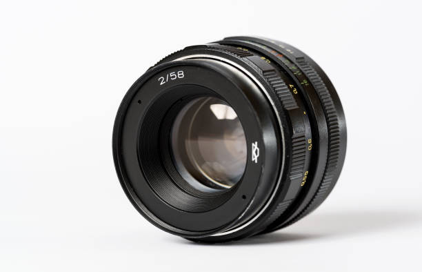 istock Vintage camera lens on white background 1145727699