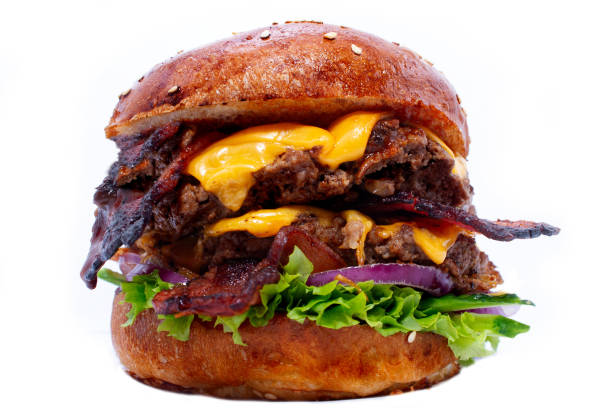 istock Juicy beef burger with bacon, cheese and salad. Close-up. 1145730589