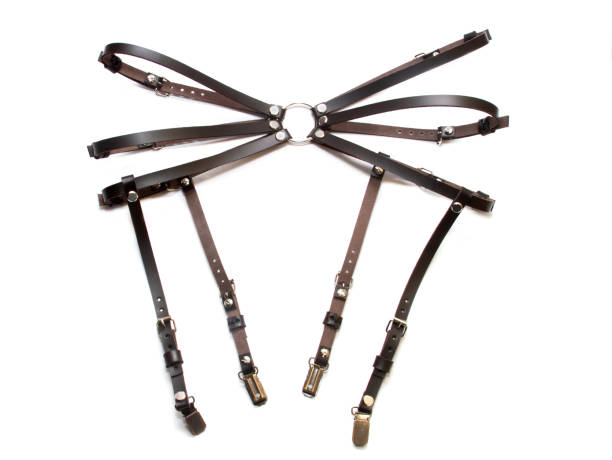 istock Leather garters belts on a white background 1145730625