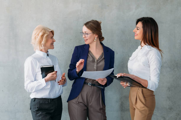 istock business conversation successful business women 1145738850