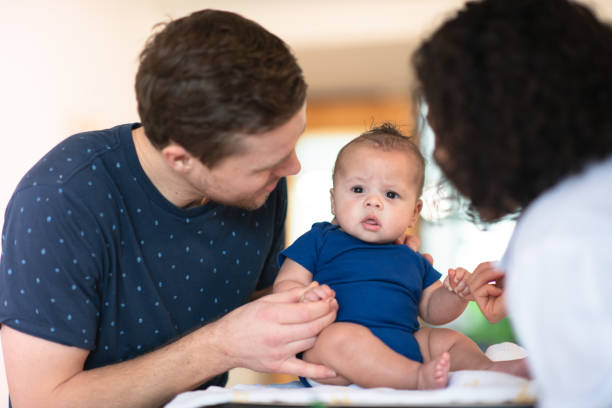 istock Doctor gives baby a checkup 1145740645
