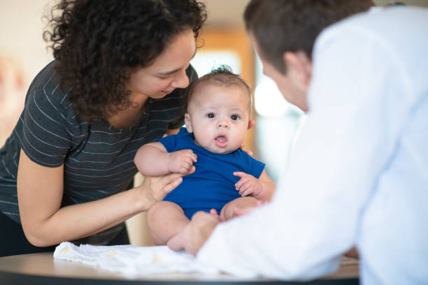 istock Mother holding her toddler 1145740647