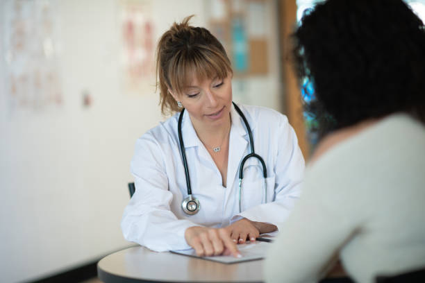 istock Doctor speaking to patient 1145741474