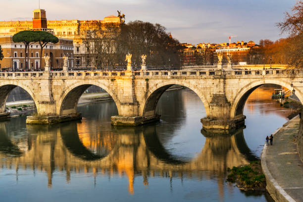 istock Bernini Angels Ponte Saint Angelo Tiber River Reflection Evening Rome Italy 1145746040