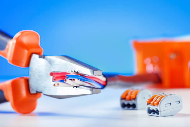 istock electrical tool and equipment. Work on the electric cable. 1145746271