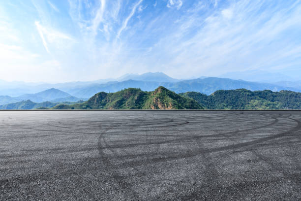 istock Asphalt race track and beautiful natural landscape 1145754105