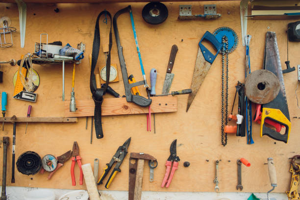 istock old vintage hand tools on wooden background 1145754522