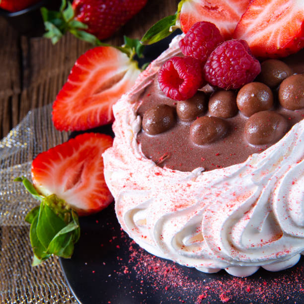 light pavlova with fresh fruits and chocolate