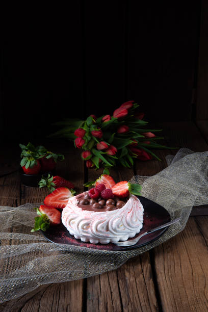 istock light pavlova with fresh fruits and chocolate 1145755269