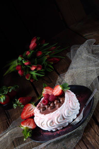 istock light pavlova with fresh fruits and chocolate 1145755298