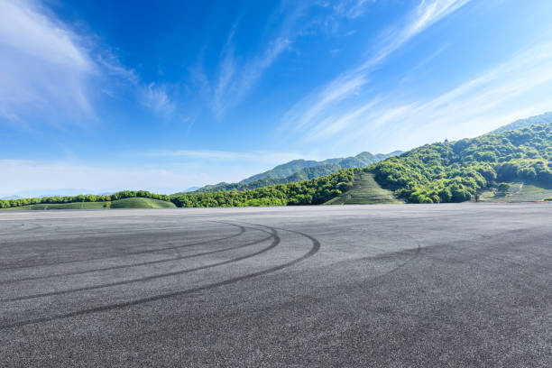 istock Asphalt race track and beautiful natural landscape 1145756457