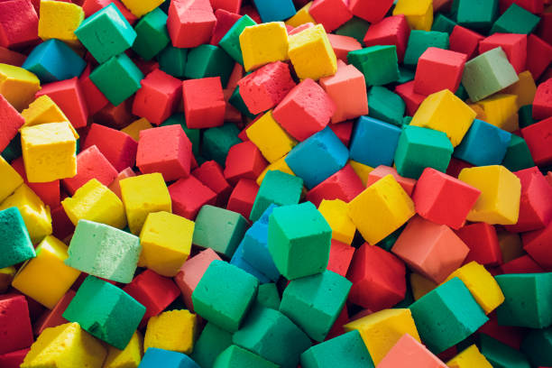 istock Many colorful soft blocks in a kids' pool at a playground. Bright multi-colored soft cubes, geometric toys. Multicolored background. 1145757912