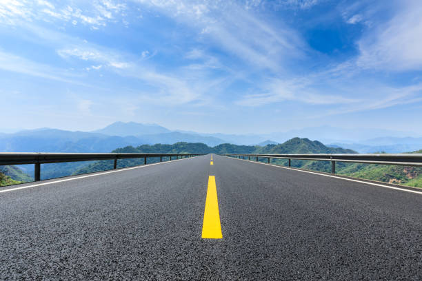 istock Straight highway and beautiful natural landscape 1145758038