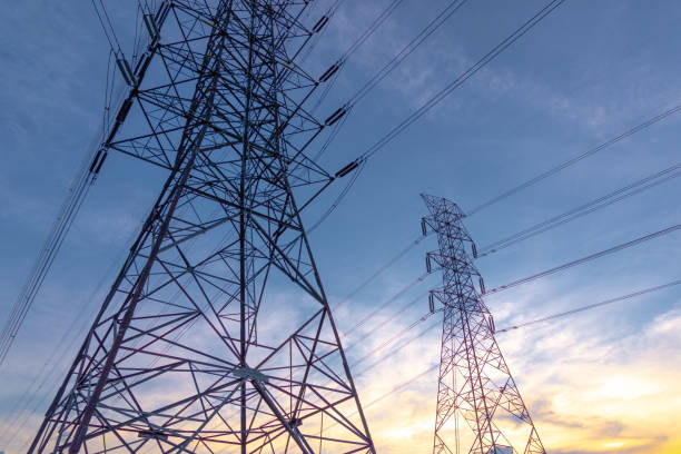 istock Electricity concept. Close up high voltage power lines station. 1145761847