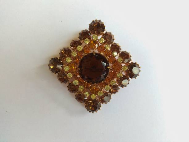 istock Brown vintage antique brooch closeup 1145765096
