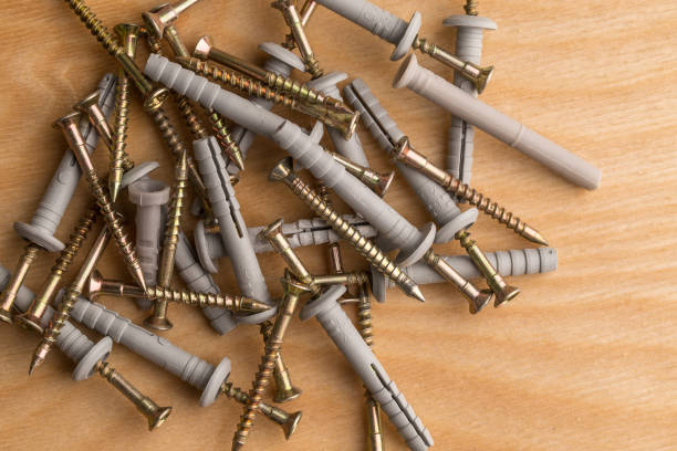 istock Dowel for fixing building materials on wooden  background 1145765175