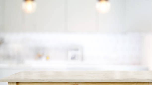 istock Empty white marble top table in modern kitchen room background. For product or food montage 1145765549