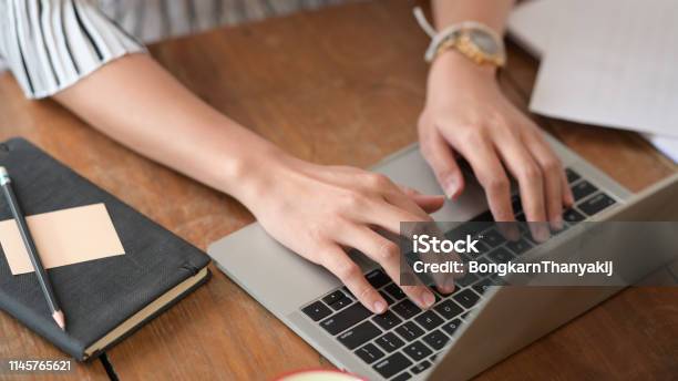 Cropped Shot Of Businesswoman Working And Using Laptop Computer Stock Photo - Download Image Now