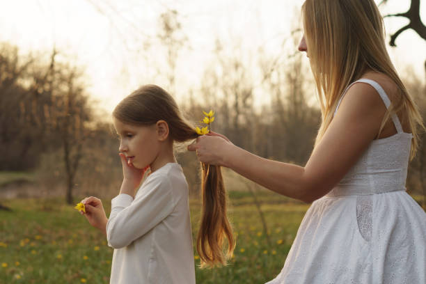 istock Happy family walks in the spring meadow 1145767430