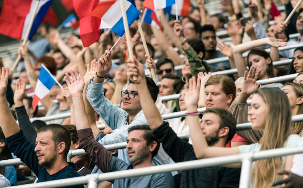 istock French Fans With Waving Flags 1145768170