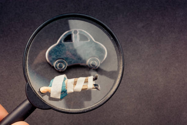 istock Little metal car model on dark background 1145768803