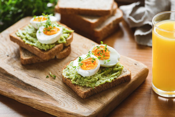 istock Healthy toast with avocado, egg, micro greens 1145769973