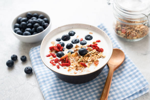istock Yogurt bowl with granola and berries 1145770111