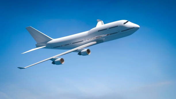 istock airplane in the blue sky 1145770120