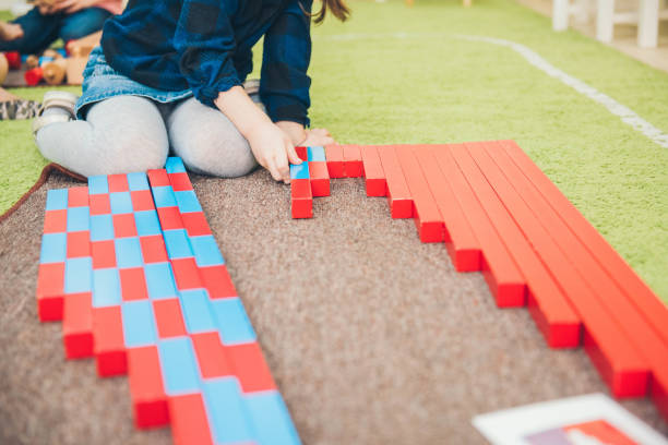 Montessori Education. Montessori School. Learning materials in a montessori methodology school. Geometry and mathematics materials. Montessori Numerical Rods Montessori montessori stock pictures, royalty-free photos & images