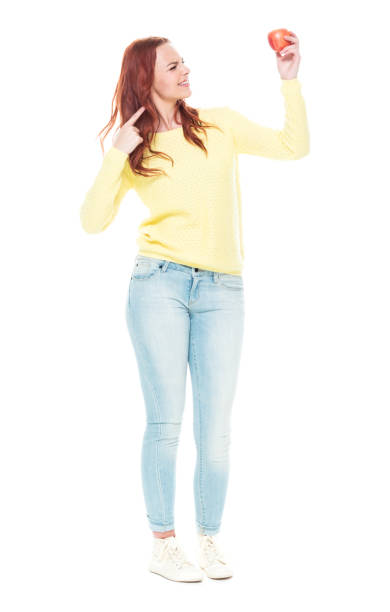 istock Female holding an apple 1145771869