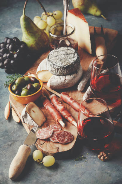istock Red wine with charcuterie assortment on the stone background 1145772276