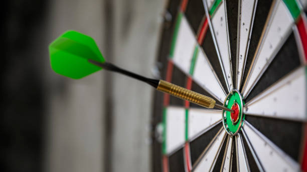 istock a typical darts game with dart in the bullseye 1145773516