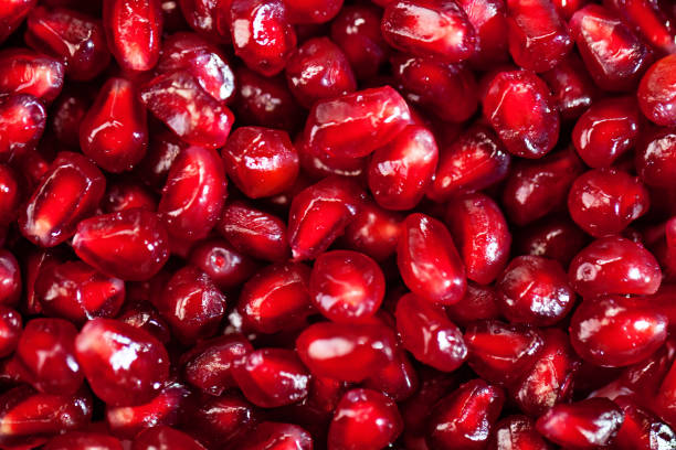 istock Fresh pomegranate seeds for food background. Texture from pomegranate seeds. Top view. 1145773650
