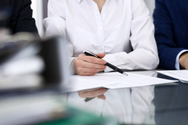 istock Bookkeepers team or financial inspectors  making report, calculating or checking balance. Group of people at work. Business operations concept 1145773733