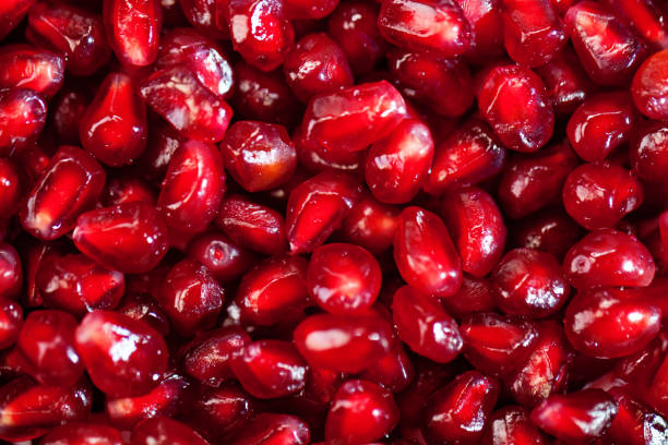 istock Fresh pomegranate seeds for food background. Texture from pomegranate seeds. Top view. 1145774069