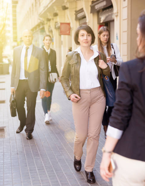 istock Men and women in business suits 1145774130