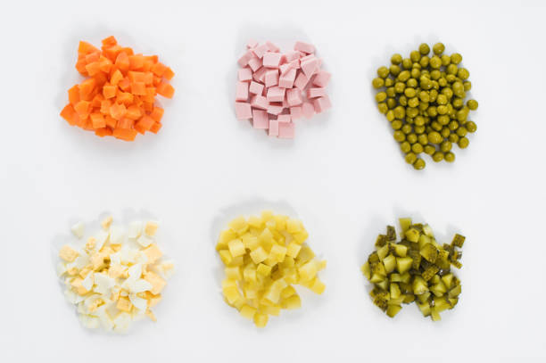 istock Ingredients for Russian salad on white background. 1145776726