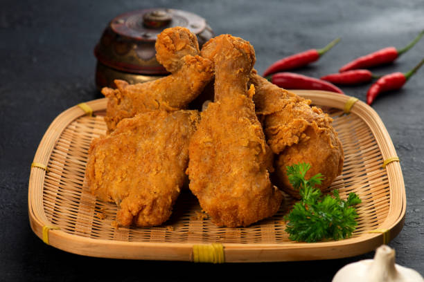 istock crispy spicy fried chicken in a wooden table 1145778427