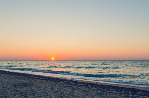 istock Beautiful sunrise or sunset on the sea beach 1145779912