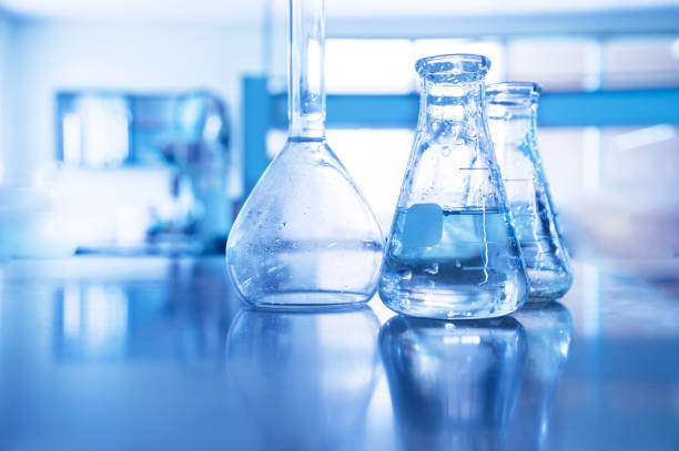 istock conical and volumetric glass flask in science laboratory for blue education technology background 1145781245